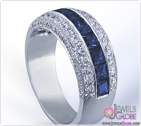 rincess cut Sapphires are beautifully accompanied by .70 ct. tw. Round Diamonds in this Sapphire Diamond wedding band